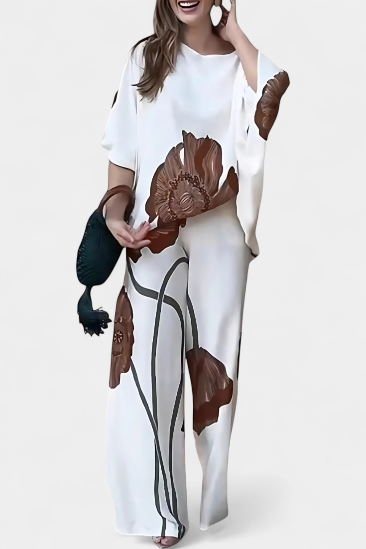 Sybella Completo Floreale di Due Pezzi con Spalla Scoperta e Pantaloni Dritti